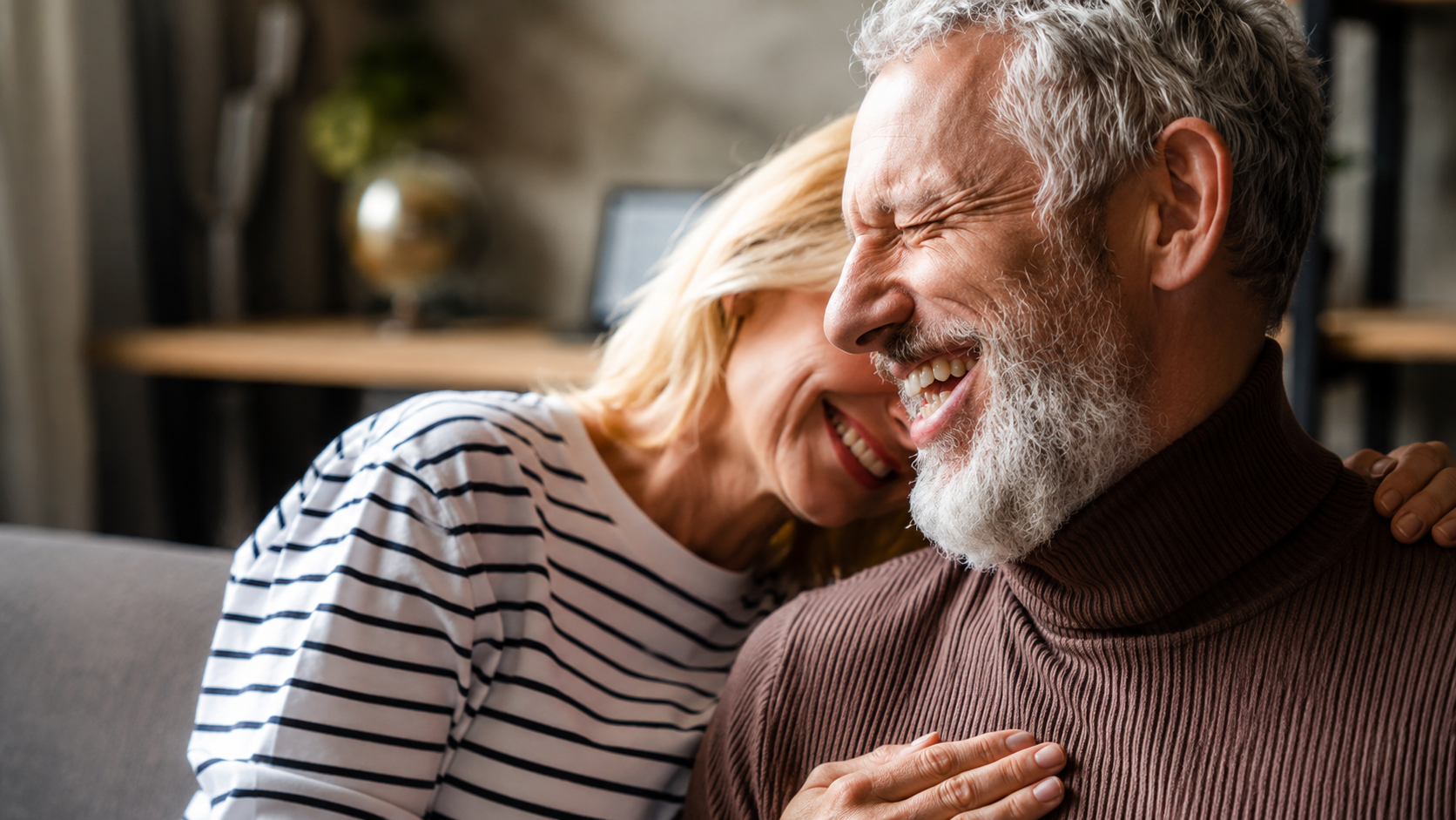 Happy patient smiling after immediate dental implant treatment