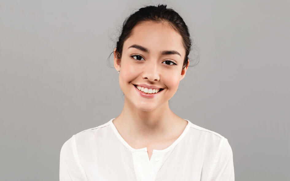 Smiling patient after a smile makeover at Woodbridge Hill Dental Practice
